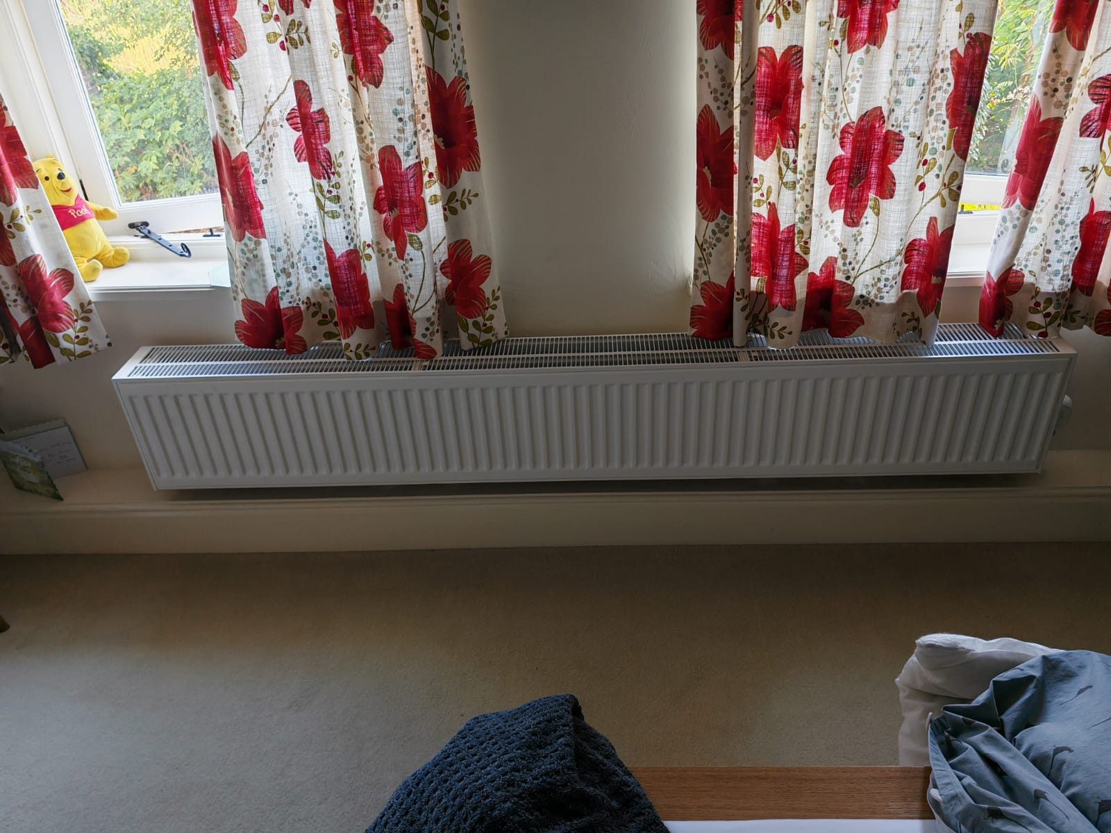 Wide radiator under the window. Whole house air source heat pump by FB Gas, photo 19